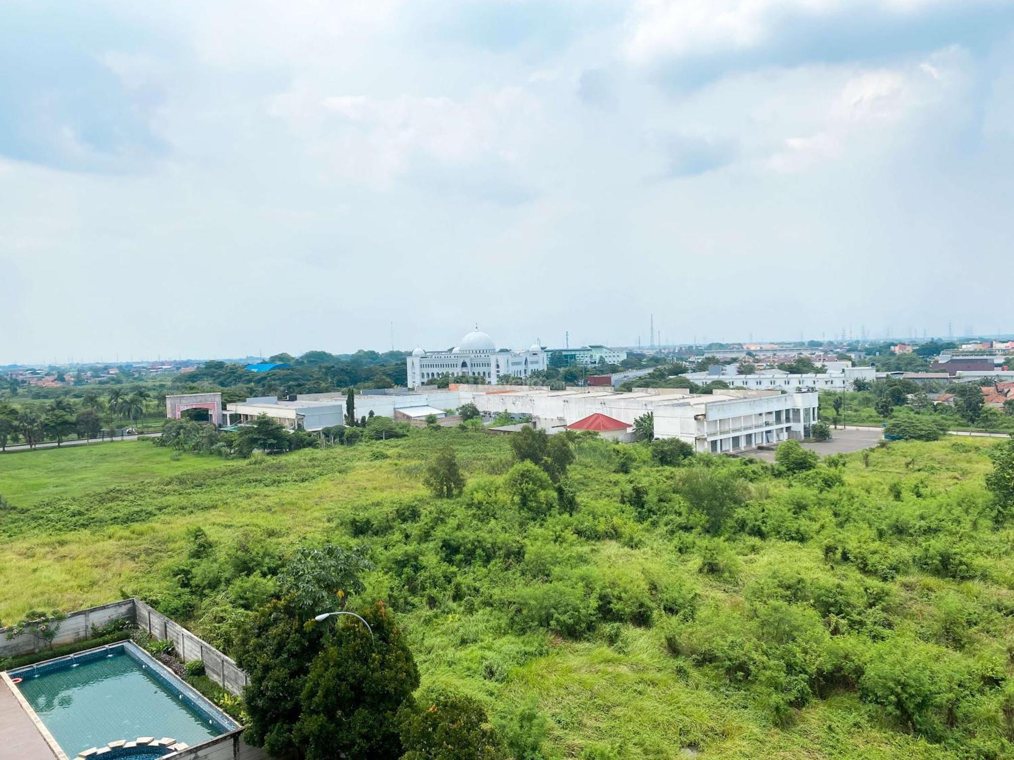 Restful And Comfy Studio Enviro Apartment By Travelio Cikarang Bagian luar foto